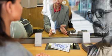 Woman attempting to cash check on her lunch break