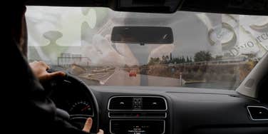 man driving thinking about ending his marriage