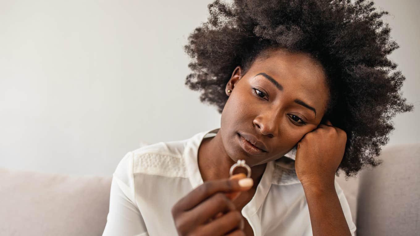 Quiet Behaviors Of A Truly Miserable Wife miserable wife looking at her wedding ring