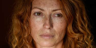 woman who has been through a lot in life looking sad
