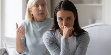 angry parent yelling at adult daughter